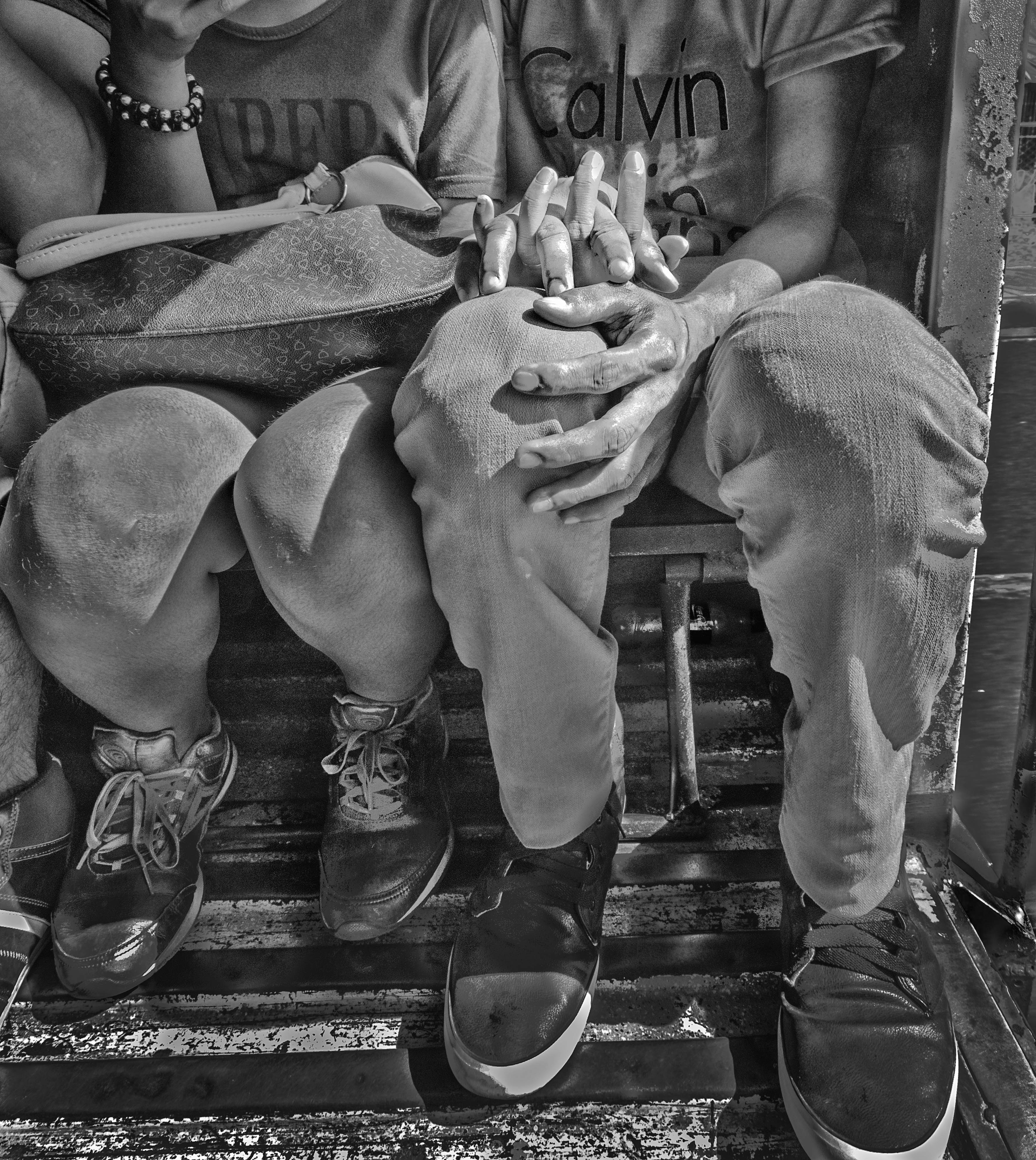 Holding hands in a crowded jeepney